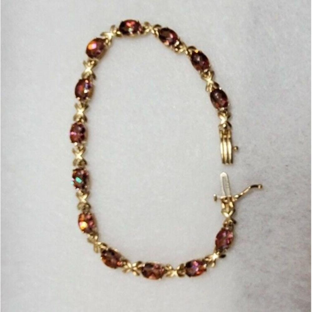 Mystic Twilight Topaz bracelet 14kt yellow gold 7x5mm oval
